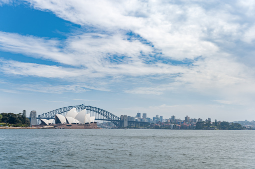 Sydney Opera House and Harbour Bridge in background. Australia