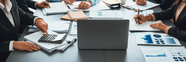 istock Auditor team working in office, analyzing financial data and accounting. Insight 2053073790