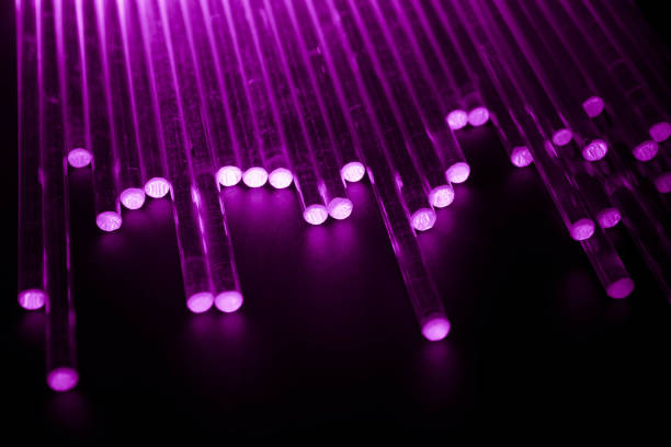 istock glowing optical violet fiber in the dark 2053089873