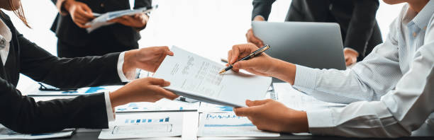 istock Auditor team working in office, analyzing financial data and accounting. Insight 2053089886