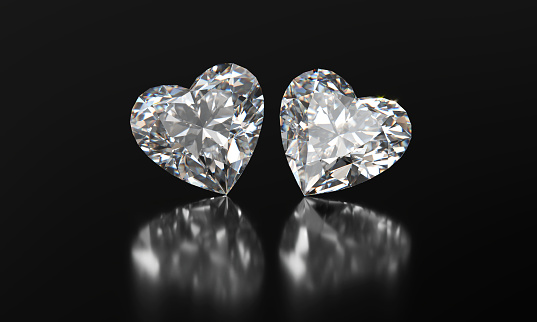 Heart shape diamonds placed on glossy background 3d Rendering