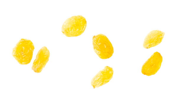 istock yellow raisins isolated on white background. Top view. 2053136873