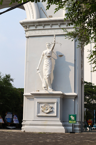 surabaya, indonesia - 21 february 2024: lady justice statue.