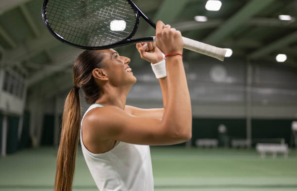 istock Female Tennis Player Showing Winner Gesture 2053164993