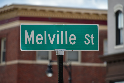 Street sign in downtown Pittsfield, Massachusetts, bearing the name of Herman Melville, author of \