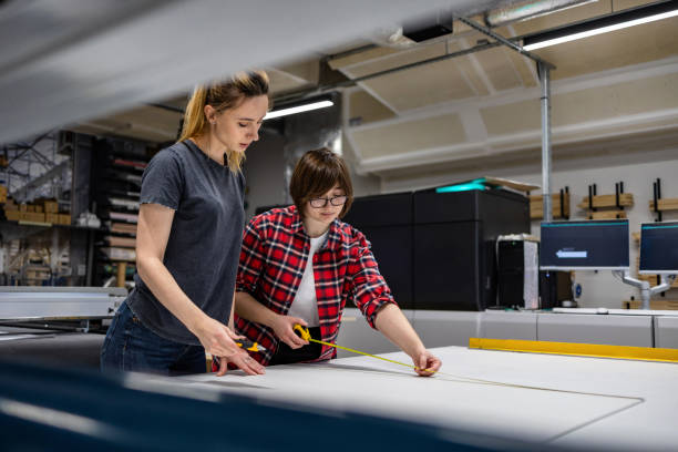 istock Professional female employees working in a printing house 2053181768