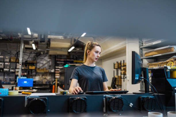 istock Woman working in a printing factory 2053182288