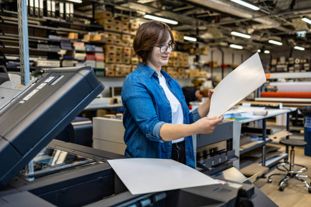 istock Woman working in a printing factory 2053182309