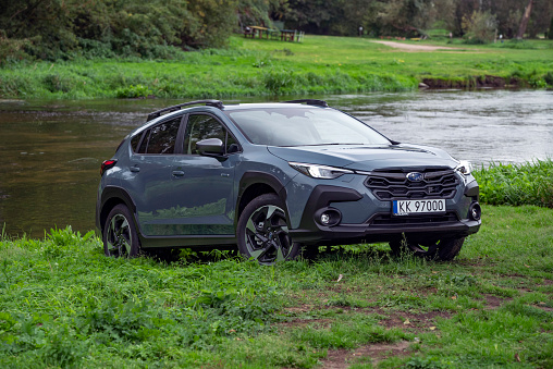 Zdiar, Slovakia - 4th October, 2023: Subaru Crosstrek stopped next to the river. This model is the most popular Subaru vehicle in Europe.