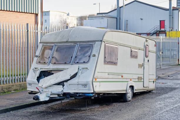 Caravan abandoned and dumped in street waiting to be removed