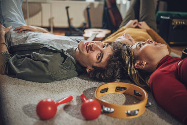 istock Friends relaxing on the floor 2053281943