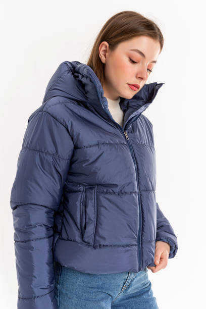 istock Brunette young woman wearing blue coat. 2053283608