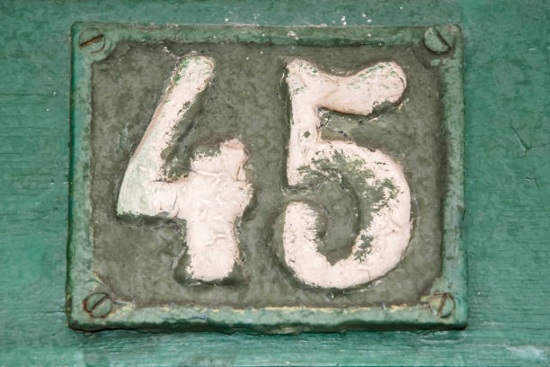 istock Old retro cast iron plate number 45 2053294401
