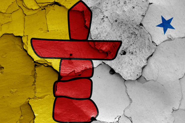 flag of Nunavut painted on cracked wall