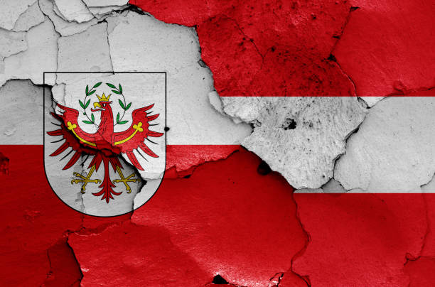 istock flags of Tyrol state and Austria painted on cracked wall 2053320008