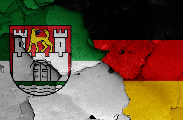 flags of Wolfsburg and Germany painted on cracked wall