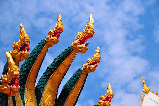 Vientiane, Laos: Wat Chan aka Wat Chantabuli - Buddhist temple facing the Mekong river - corner of Fa Ngum and Xieng Ngun streets. Head and hoods of Mucalinda, the King of the Naga serpents, a Buddhist and Hinduist hydra.