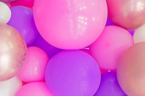 background of pink and purple balloons. Grand opening children's party