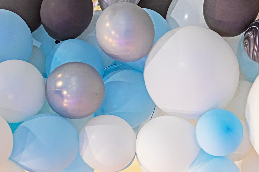 background and blue white and black balloons. Grand opening children's party