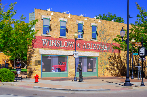 Winslow, Arizona, United States - September 19, 2023:  Building on a street corner along historic Route 66 made famous by the song Take It Easy by the Eagles in the 1970’s.