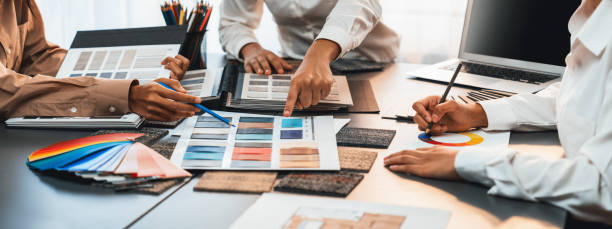istock Group of professional interior designer and architect choosing color. Insight 2053392165
