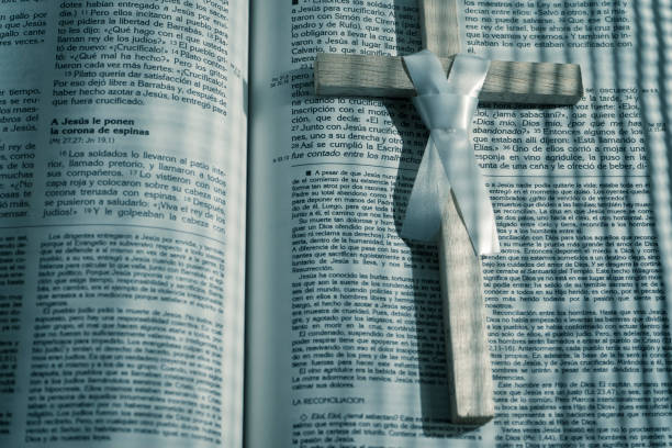 istock Wooden cross on the bible 2053401634