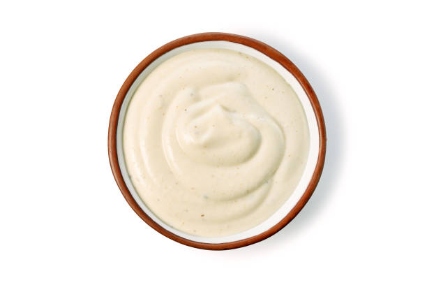 istock Bowl with tartar sauce or mayonnaise on white background 2053416480