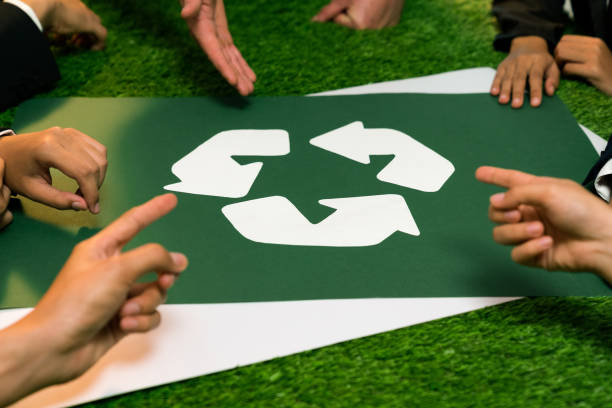 istock Recycle icon on meeting table with business people. Quaint 2053437373