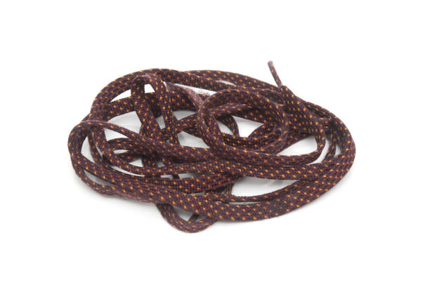 Brown shoe laces isolated on a white background