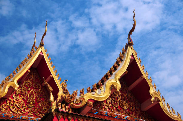 Vientiane, Laos: Wat Chan aka Wat Chantabuli Buddhist temple - Ornate gables with gold leaf floral patterns and chofa finials (\