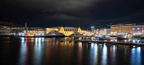 Harstad, Norway - February 19, 2024: Scenic night view of the harbor of the city of Harstad in northern Norway.