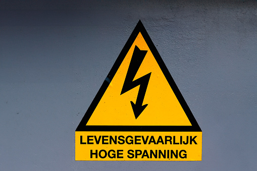 High voltage icon. Black triangle shape with black lightning sign. High voltage sign hazard warning.