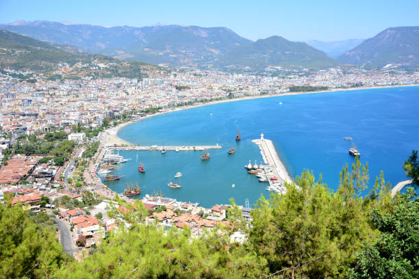 istock Alanya town with lighthouse and sea bay top view 2053549873