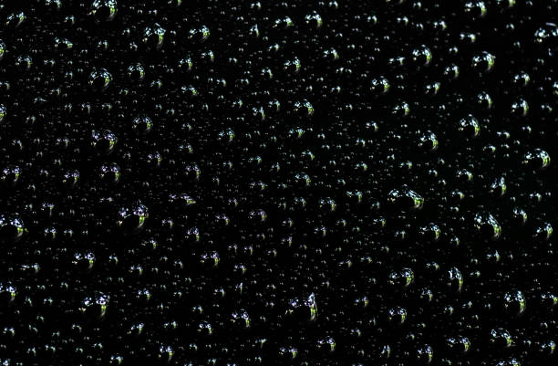 Blurred soap bubbles  with white and black tone background.