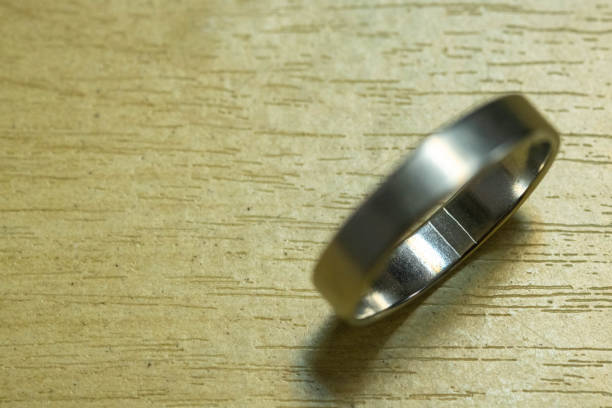 istock A silver ring sits beautifully on a yellow tree. 2053599915