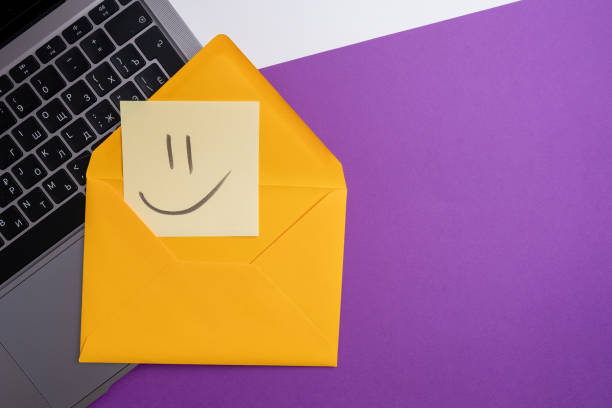 istock Paper cards with various emoticons on a colored background, banner and place for text. Conceptual image of positive thinking and satisfaction level 2053690748