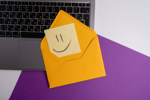 istock Paper cards with various emoticons on a colored background, banner and place for text. Conceptual image of positive thinking and satisfaction level 2053690749