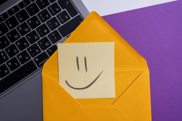 istock Paper cards with various emoticons on a colored background, banner and place for text. Conceptual image of positive thinking and satisfaction level 2053690751