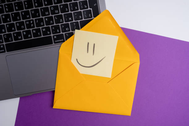 istock Paper cards with various emoticons on a colored background, banner and place for text. Conceptual image of positive thinking and satisfaction level 2053690753