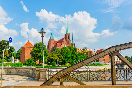Mill bridge and Wroclaw Cathedral at sunny summer day, Poland