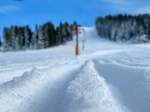 Snowy mountain and ski lift
