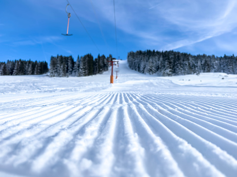 Snowy mountain and ski lift