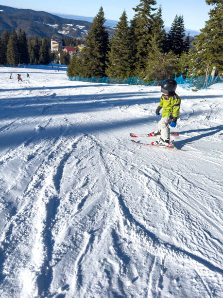 istock Ski and snow fun. Kids skiing and winter sport 2053798081