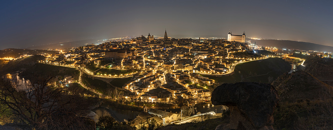 Nighttime panoramic views of the Alcázar of Toledo during a clear winter night