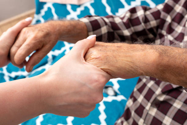 istock Woman is holding senior hand 2053900337