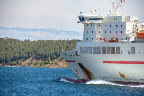 istock an old cargo ship moving at sea 2053919736