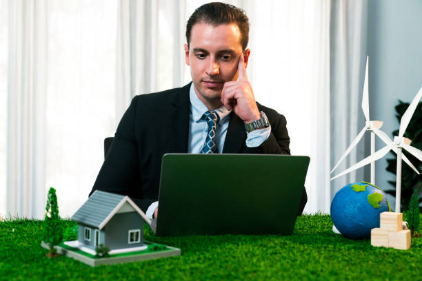 istock Businessman planning on his laptop with ECO strategy. Quaint 2053932220