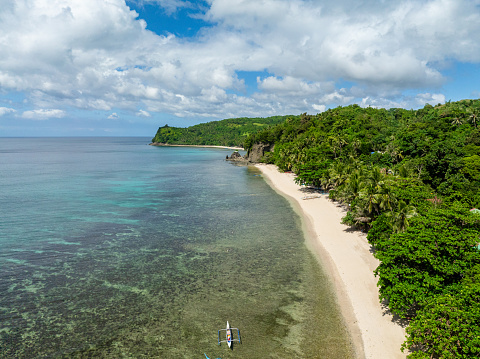 Clear water and white sand in tropical beach. Santa Fe, Tablas, Romblon. Philippines.