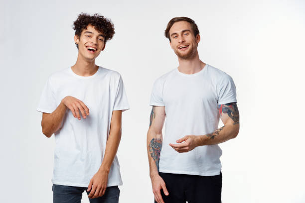 istock two friends in white t-shirts communication fun positive 2053965509
