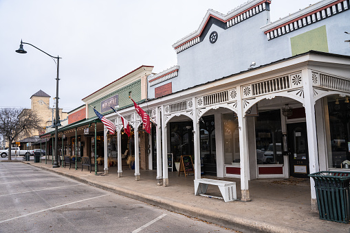 Fredericksburg, Texas - February 22, 2024:  Street scene from hill country town, Fredericksburg Texas with historic buildings in view.